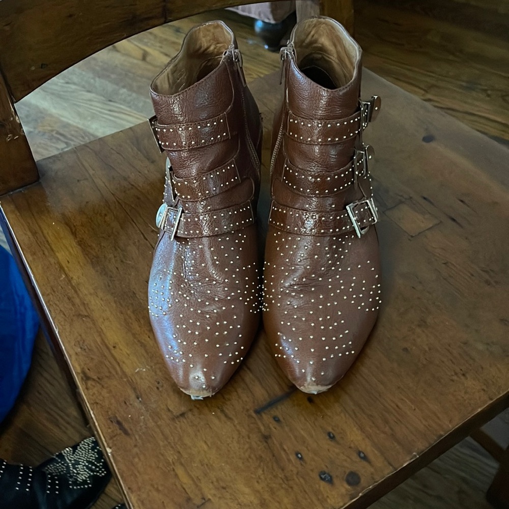 Jeffrey Campbell used booties. Some wear and tear as shown in pics